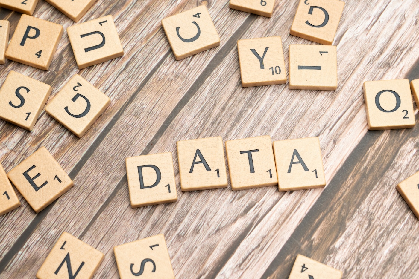 Abstract scrabble tilegraphic representing data security and compliance